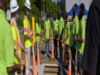 Energy Construction and Utility Program instructor talking to a group of trainees Energy Construction and Utility Program instructor talking to a group of trainees